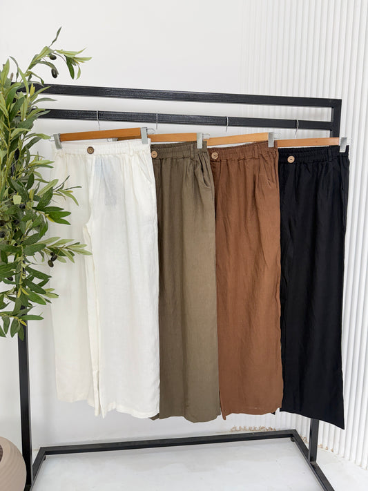 Amenaa summer linen pants in light, breathable fabric, featuring a relaxed fit and neutral color, perfect for warm weather.