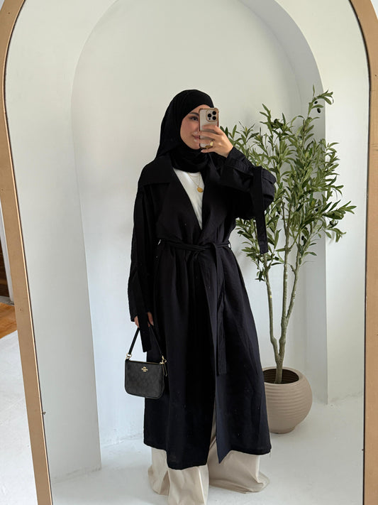 Amenaa summer trench coat in lightweight fabric, beige color, tailored fit with collar and button details.