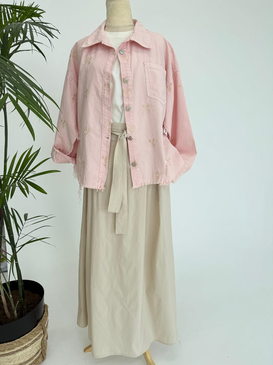 Flowery embroidered gabardine jacket by Amenaa featuring colorful floral embroidery and tailored fit.