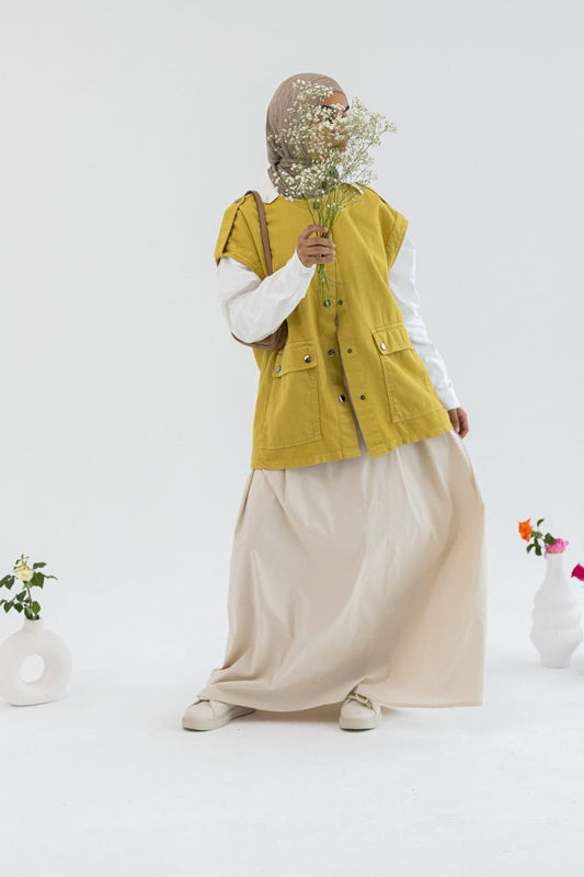 Amenaa gabardine vest, stylish and tailored, displayed on a mannequin in a professional setting.