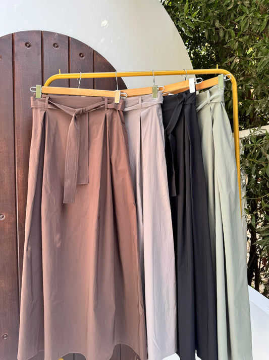 Amenaa ribbon skirt featuring a flowy design with vibrant patterns, perfect for casual and stylish outfits.