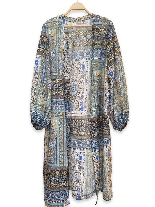 Amenaa geometric print kimono with a loose fit, featuring vibrant, colorful patterns on lightweight fabric.