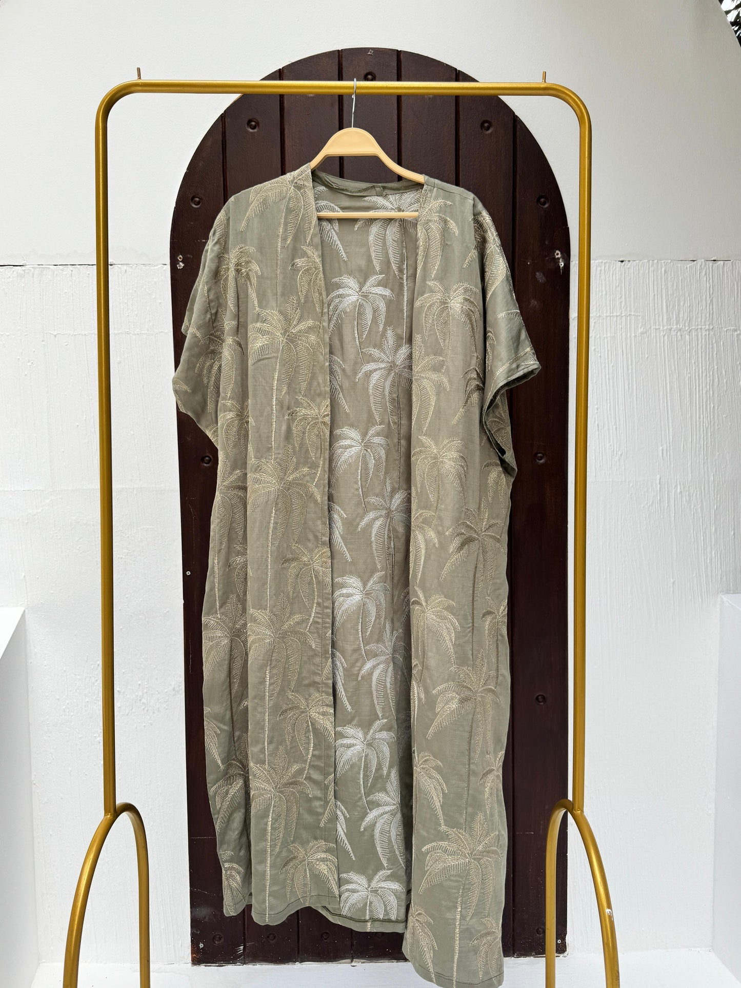 Embroidered palm kimono by Amenaa featuring intricate palm leaf embroidery, lightweight fabric, and relaxed fit for stylish comfort.