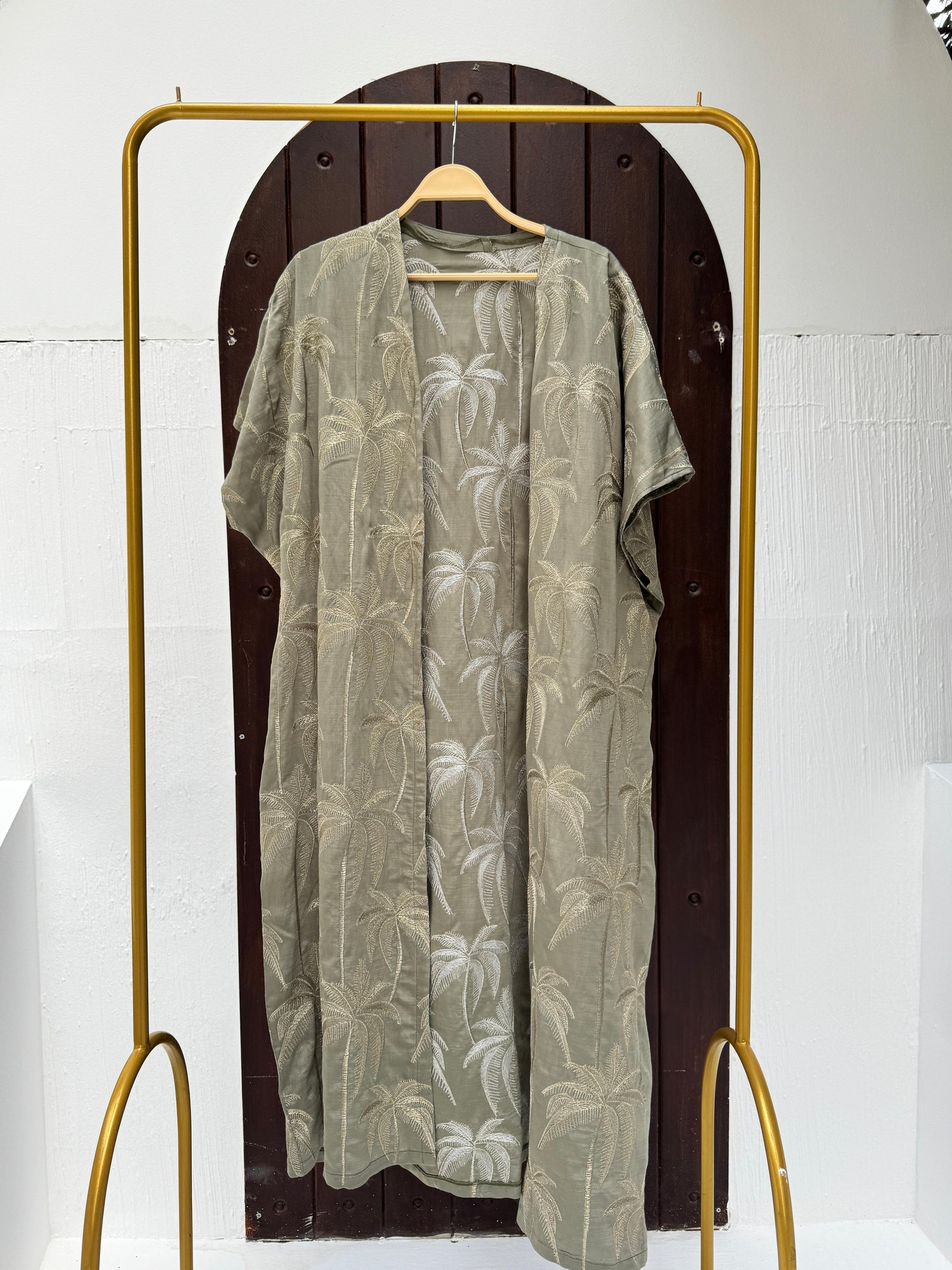 Embroidered palm kimono by Amenaa featuring intricate palm leaf embroidery, lightweight fabric, and relaxed fit for stylish comfort.
