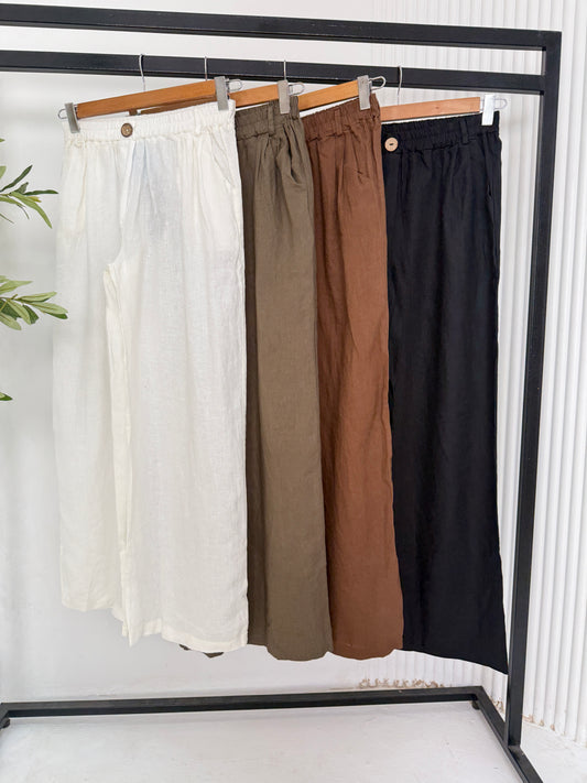 Amenaa summer linen pants in light beige, featuring a relaxed fit with a comfortable waistband and breathable fabric.