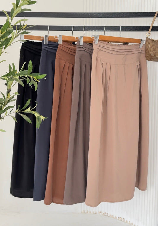 Amenaa new skirt in stylish design, featuring a flowy fabric and elegant fit, perfect for casual or dressy occasions.
