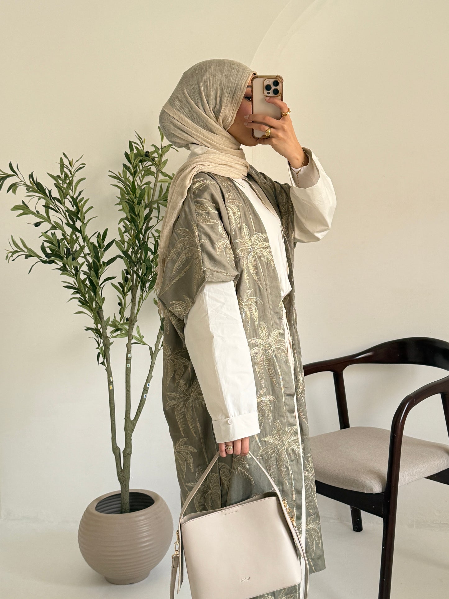 Embroidered palm kimono by Amenaa, featuring intricate palm leaf embroidery on lightweight fabric, perfect for stylish layering.