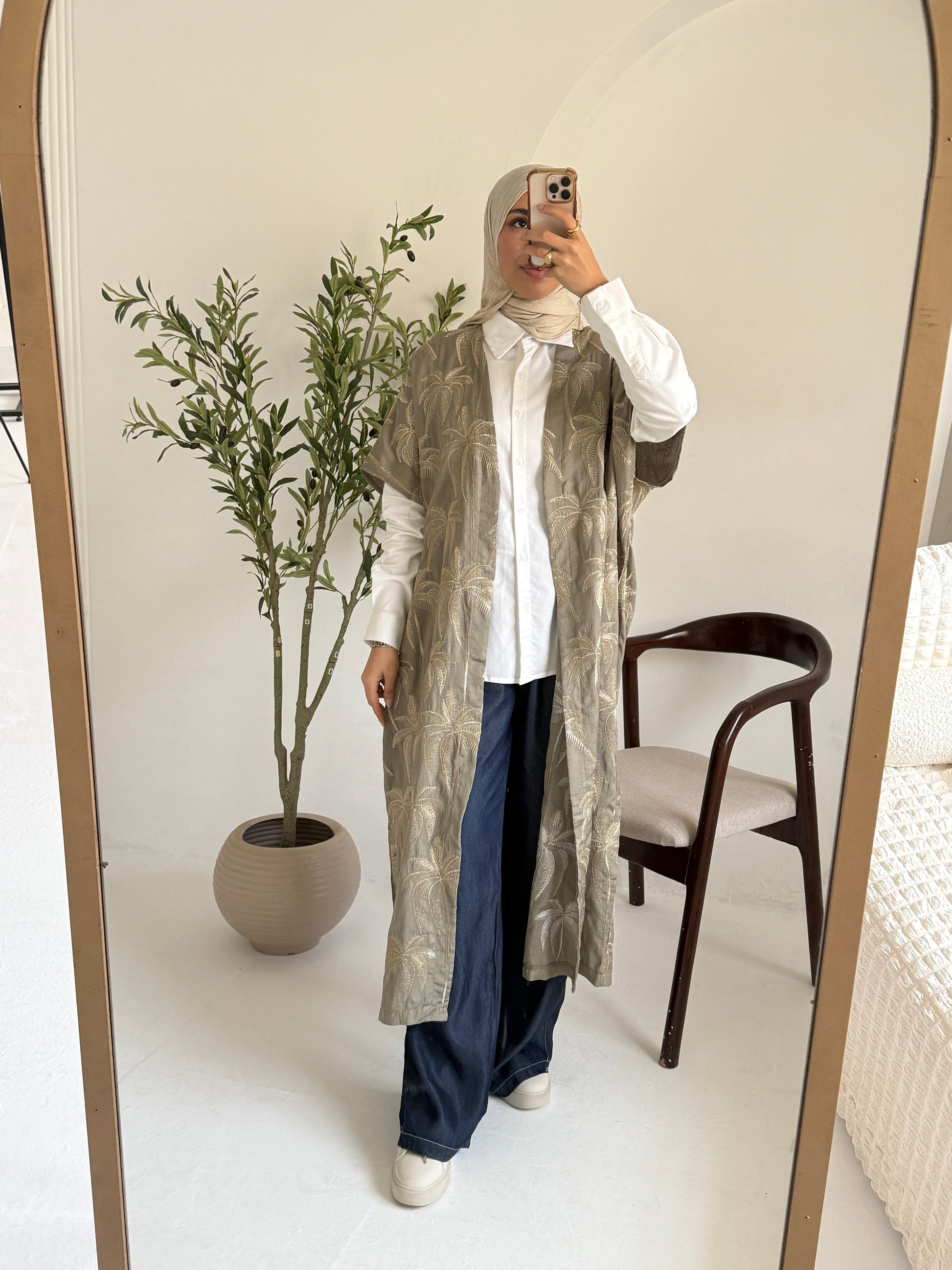 Amenaa Tensile Jeans featuring a classic blue denim design with a relaxed fit and visible stitching details.