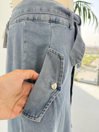 Amenaa button denim skirt with front pockets and metal button closure, casual and trendy denim skirt for women.