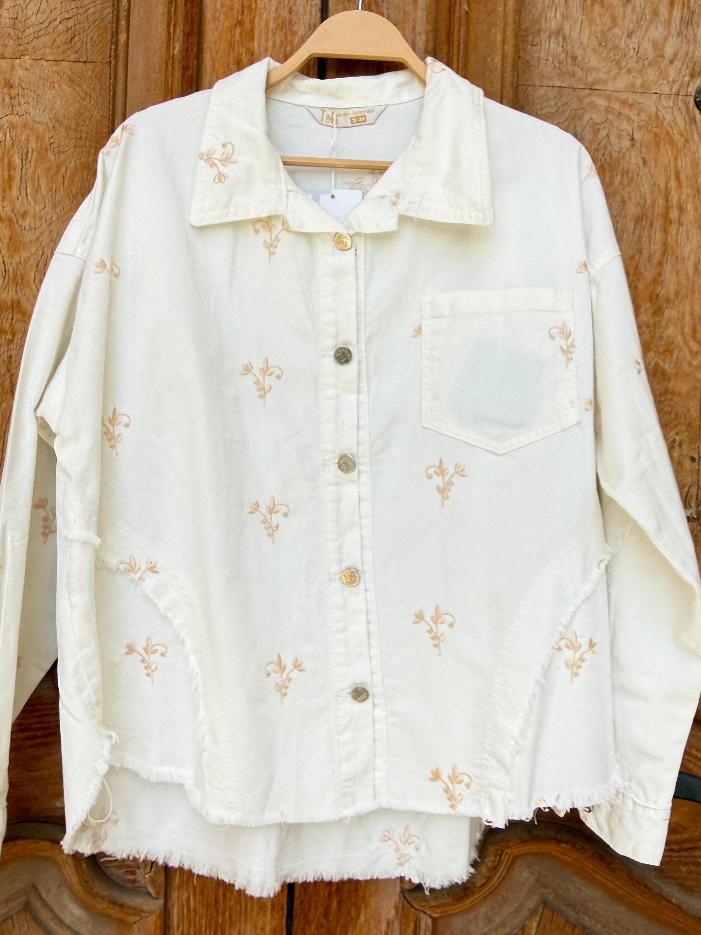 Flowery embroidered Amenaa gabardine jacket featuring colorful floral patterns, button closure, and tailored fit.
