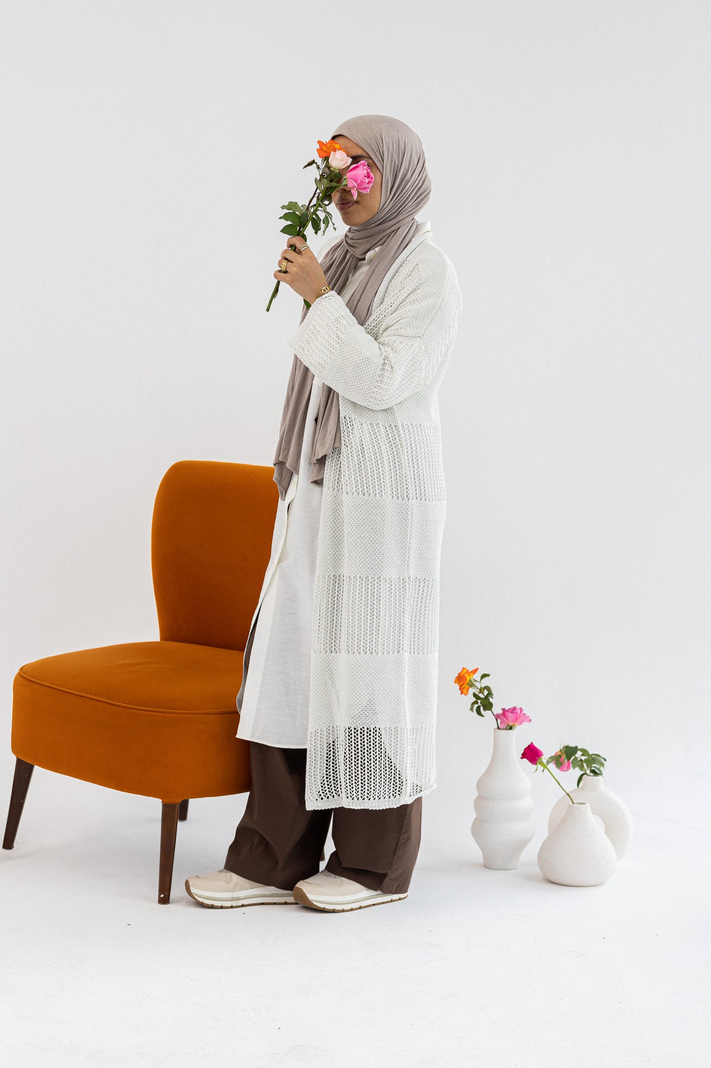 Light summer net kimono by Amenaa featuring delicate mesh fabric and open front design, perfect for warm weather.