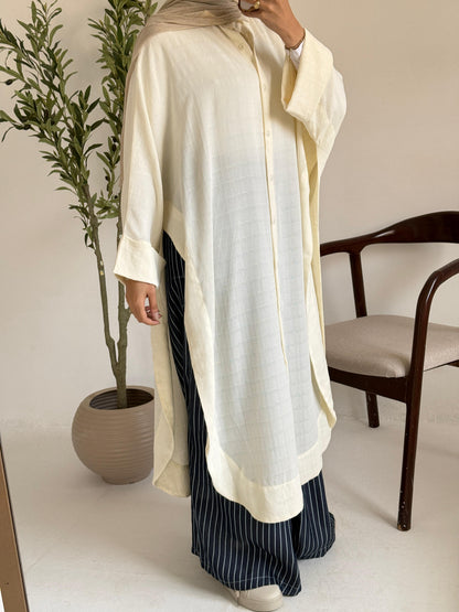 Amenaa textured oversized shirt dress displayed on a model, featuring a relaxed fit and casual style.