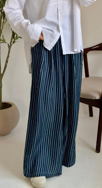 Amenaa wide leg striped pants featuring a relaxed fit and bold vertical stripes, perfect for casual and stylish outfits.