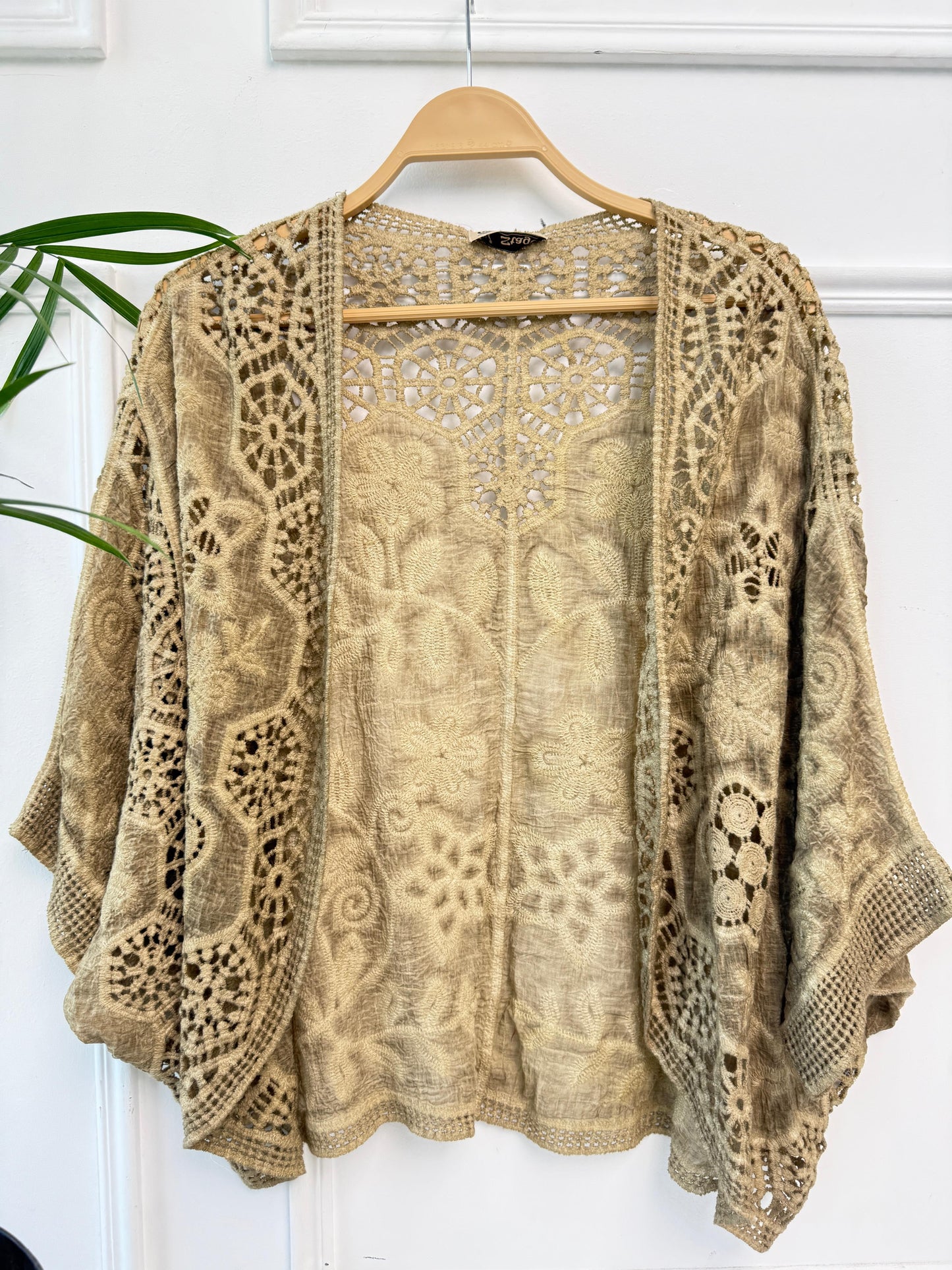 Boho crochet lace kimono by Amenaa featuring intricate lace details and lightweight flowy fabric for a stylish layered look.