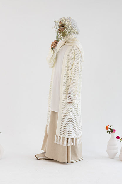 Amenaa crochet knit cardigan in beige, featuring a textured, open-knit design with long sleeves and a cozy, stylish fit.