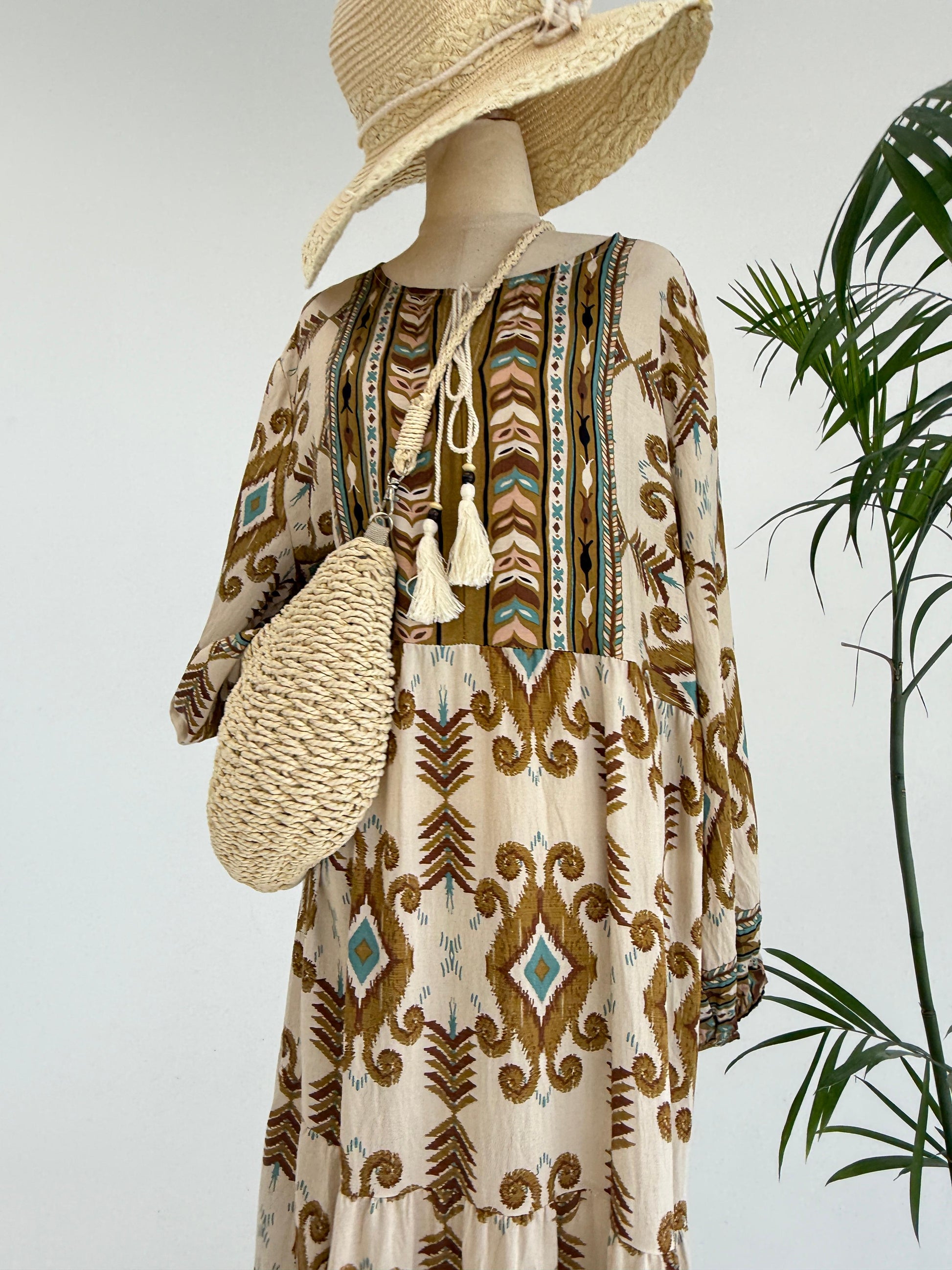 Amenaa boho pattern maxi dress featuring vibrant, flowing fabric and a relaxed fit, perfect for casual or bohemian style wear.