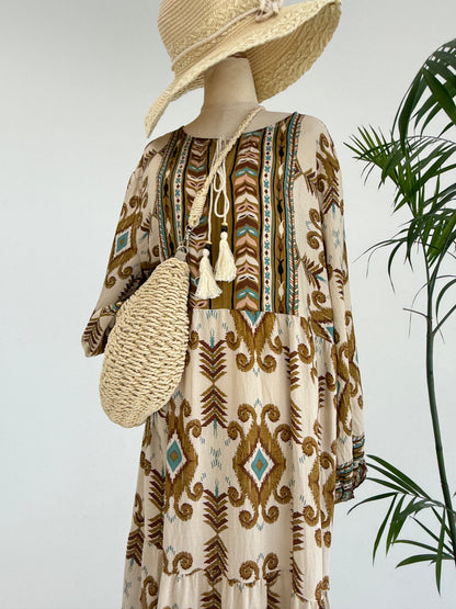 Amenaa boho pattern maxi dress featuring vibrant, flowing fabric and a relaxed fit, perfect for casual or bohemian style wear.