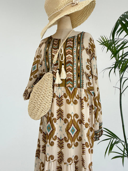 Amenaa boho pattern maxi dress featuring vibrant, flowing fabric and a relaxed fit, perfect for casual or bohemian style wear.