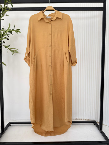 Amenaa shirt dress with long sleeves and a relaxed fit, featuring a classic collar and button-down front.