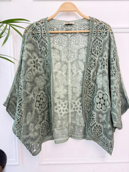 Amenaa boho crochet lace kimono with intricate patterns and lightweight fabric, perfect for casual or beachwear styles.