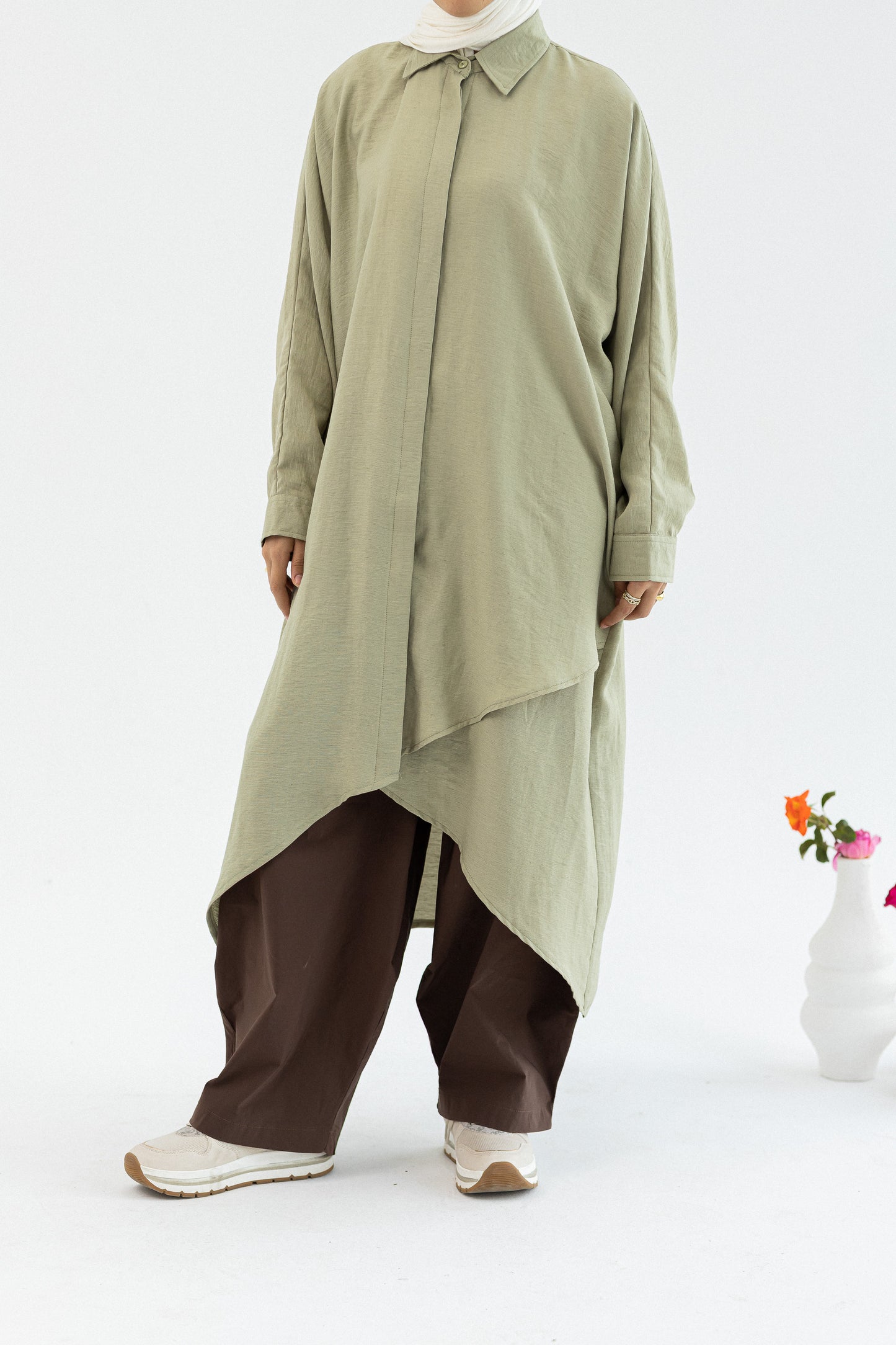 Amenaa Minimal Flow Tunic in soft fabric, featuring a relaxed fit and minimal design, shown on a model.
