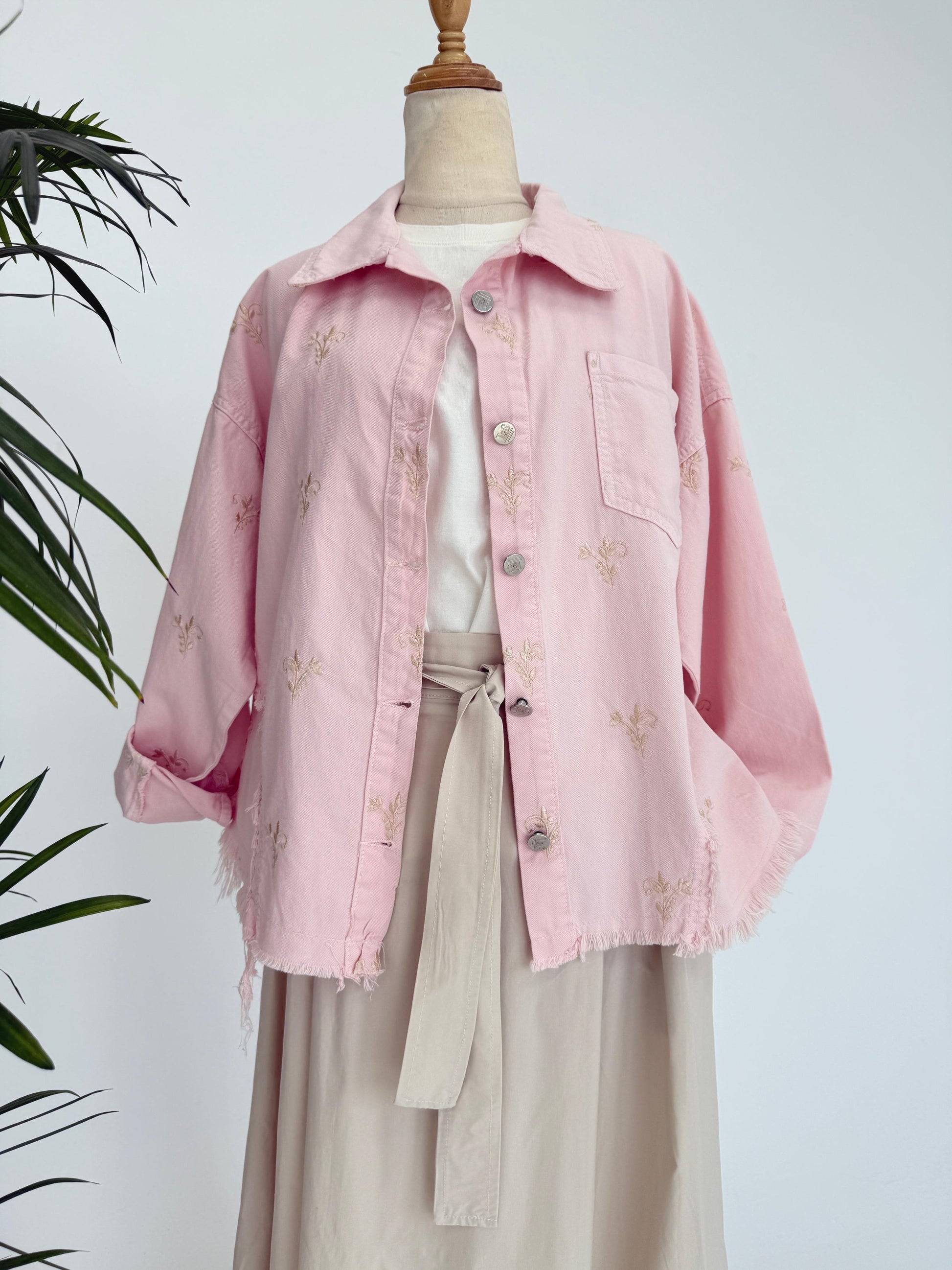 Amenaa flowery embroidered gabardine jacket with colorful floral patterns and tailored fit, shown on a model.