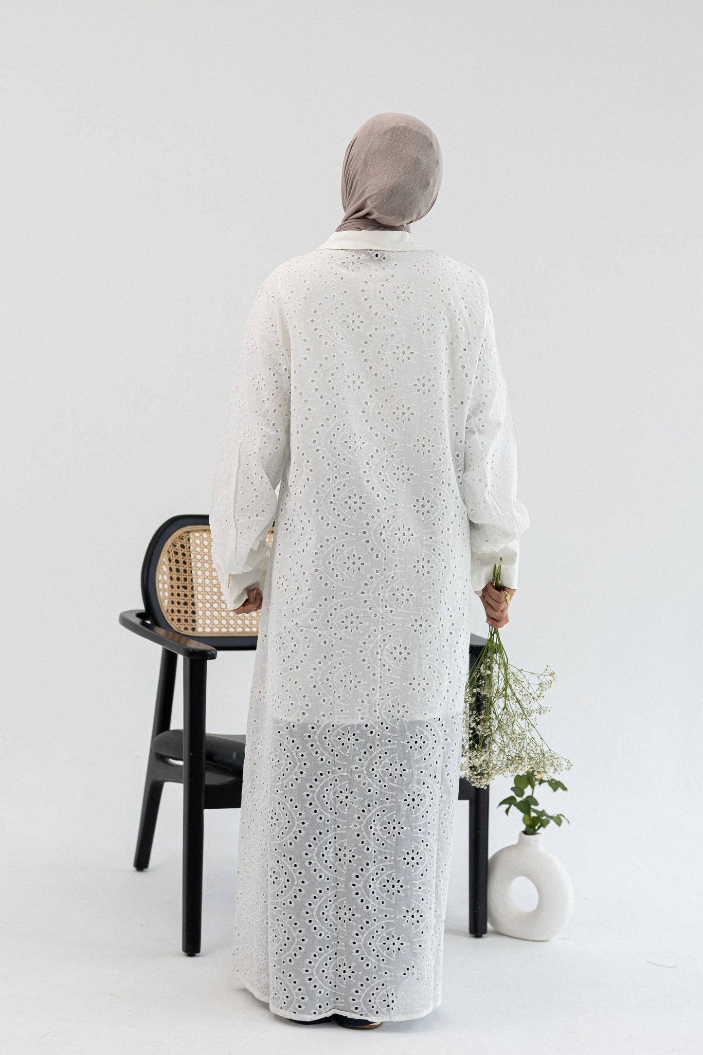 Amenaa Rokama Shirt Dress displayed on a model, featuring a button-up design, collar, and casual fit in lightweight fabric.