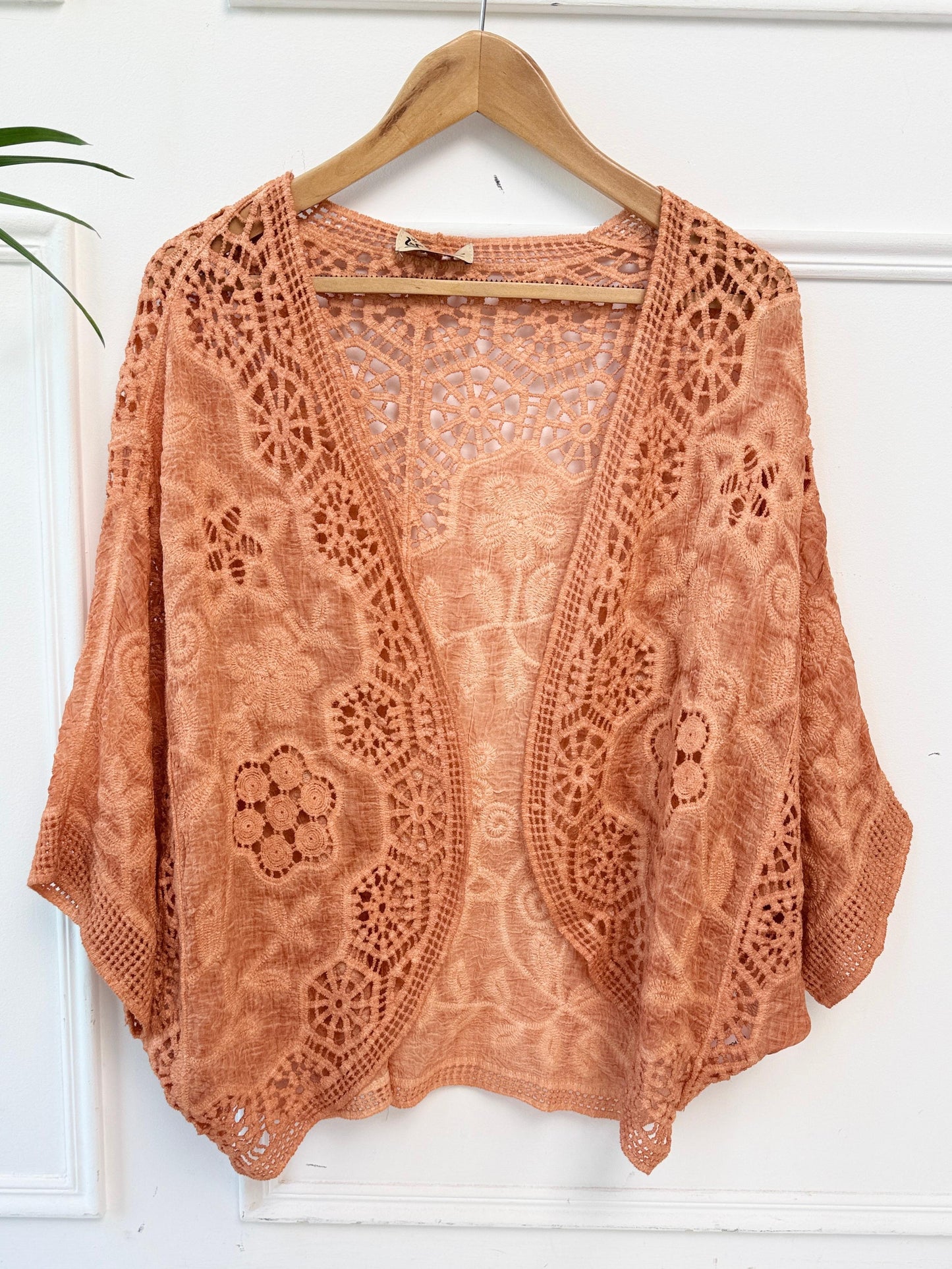 Boho crochet lace kimono by Amenaa featuring intricate lace details and flowing fabric, perfect for bohemian style outfits.