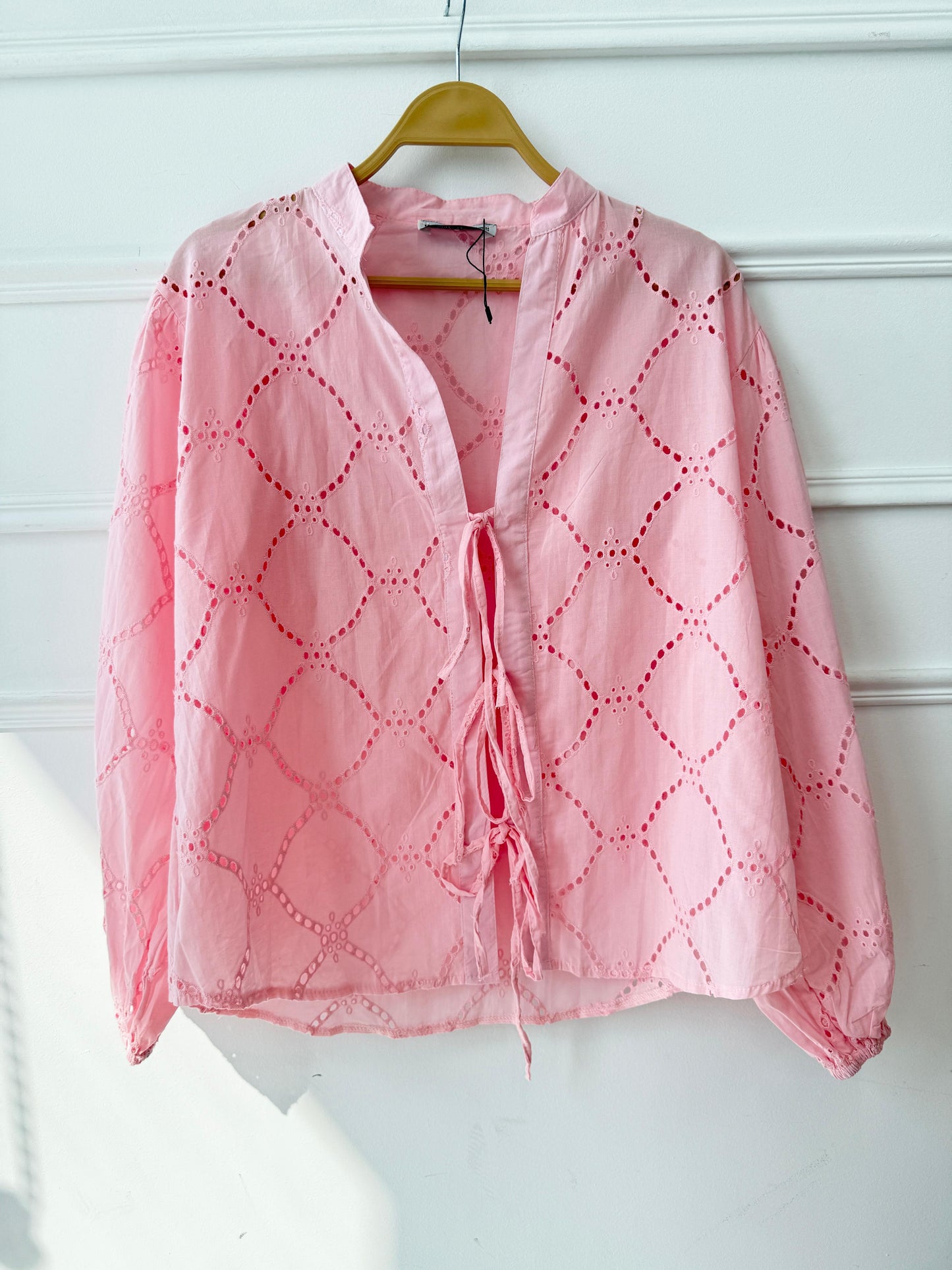 Amenaa Summer Rokama Tie Blouse, lightweight fabric, featuring a stylish tie detail and a relaxed fit, perfect for warm weather.