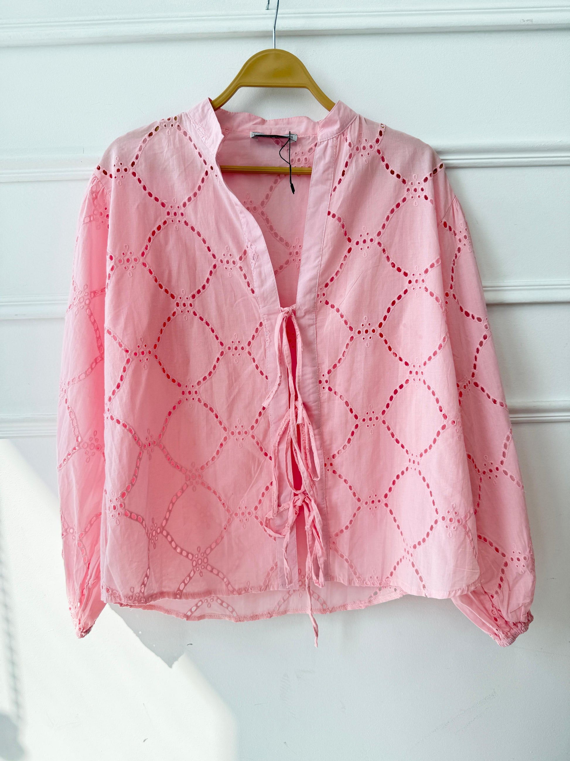 Amenaa Summer Rokama Tie Blouse, lightweight fabric, featuring a stylish tie detail and a relaxed fit, perfect for warm weather.