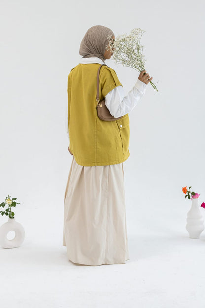 Amenaa gabardine vest in navy blue, tailored fit with front button closure and sleek design, suitable for casual or semi-formal wear.