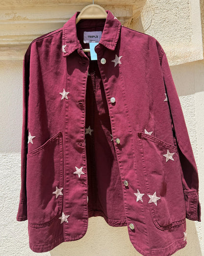 Amenaa Star Gabardine Jacket displayed on a hanger, featuring a stylish navy design with star patterns and classic collar.