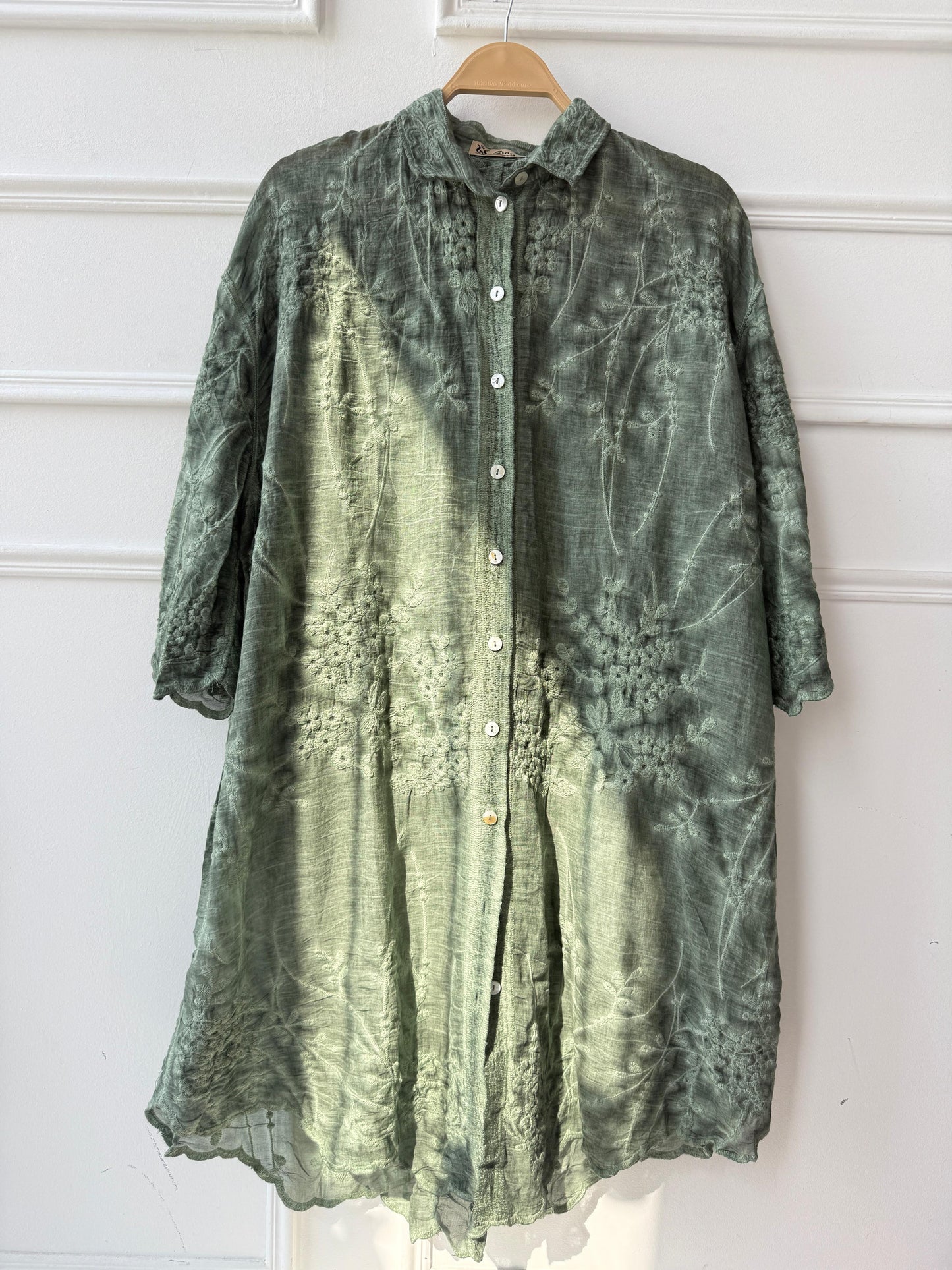 Amenaa embroidered shirt with intricate floral patterns, showcasing detailed embroidery on soft fabric.