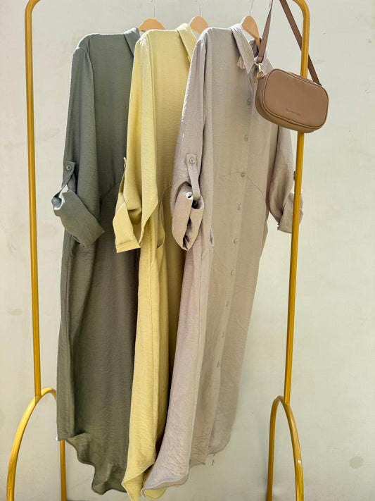 Amenaa shirt dress in soft fabric with a relaxed fit, featuring a collar and button front, styled with long sleeves.
