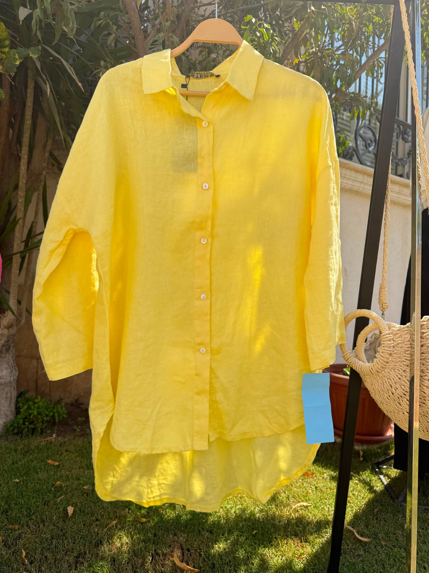 Men's linen shirt by Amenaa featuring a relaxed fit, lightweight fabric, and casual style with long sleeves and a button-up front.