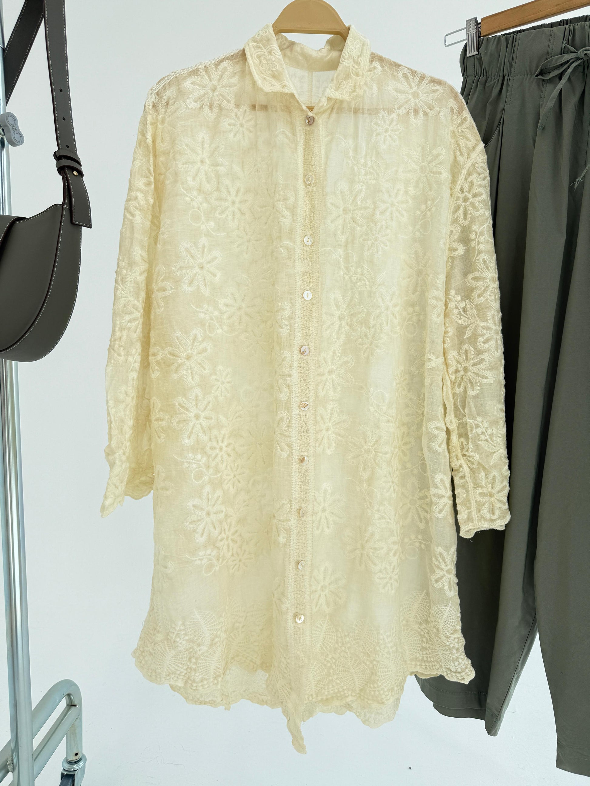 Amenaa Guipure Shirt with intricate lace pattern, long sleeves, and elegant design ideal for stylish, sophisticated looks.