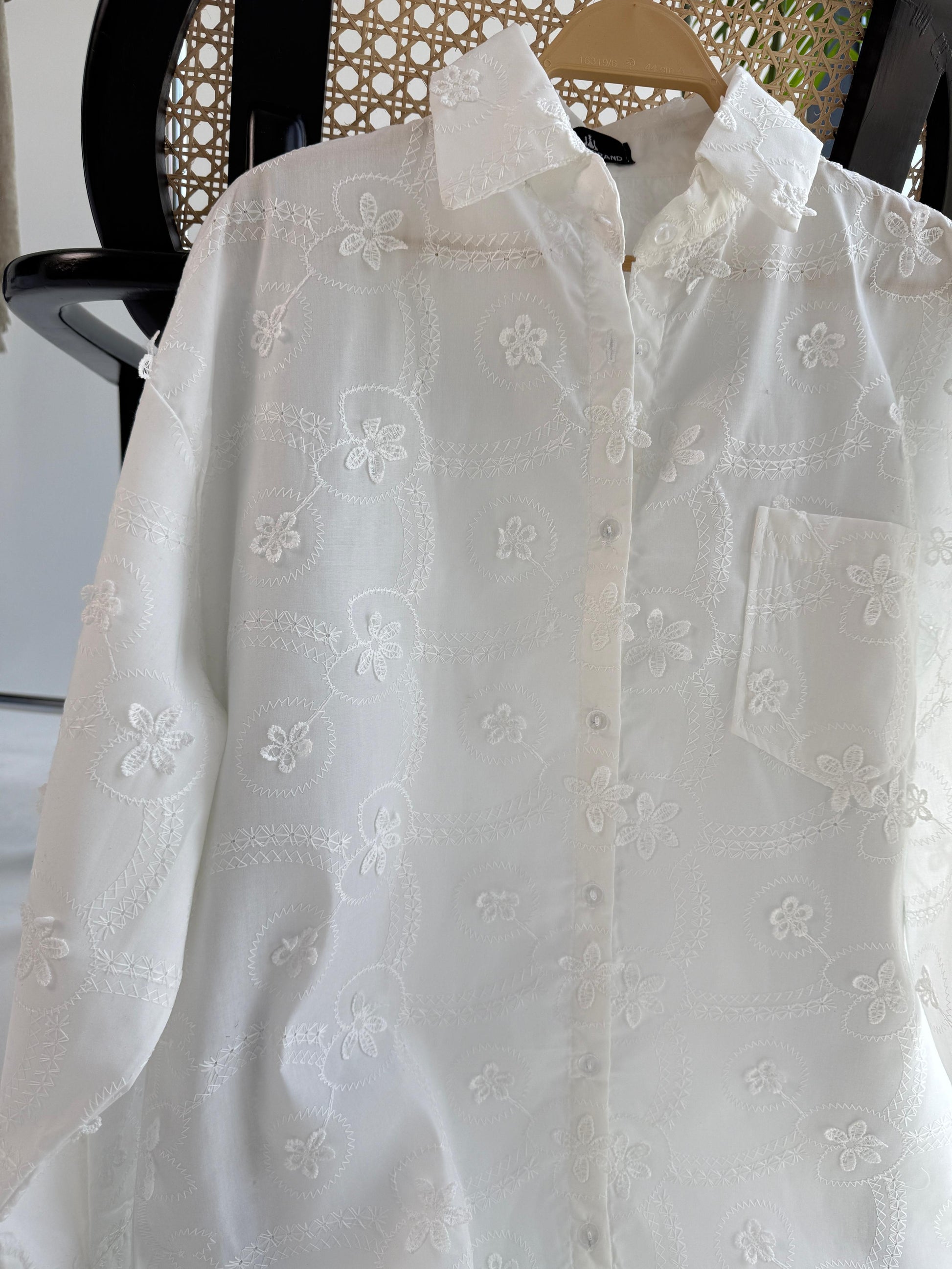 Floral embroidered Amenaa shirt with intricate embroidery details on lightweight fabric, perfect for casual or semi-formal wear.