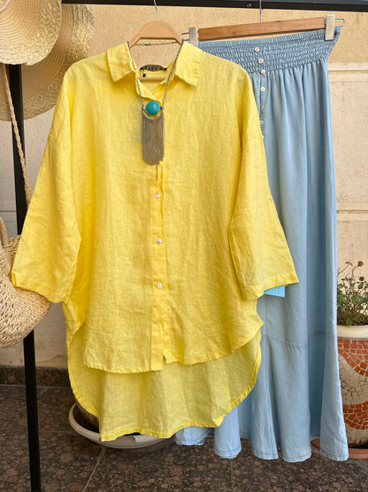 Amenaa linen shirt displayed on a hanger, showcasing lightweight, breathable fabric and casual, stylish design for warm weather.