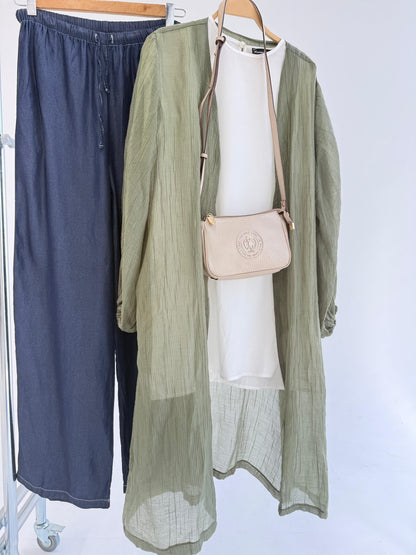 Crushed kimono jacket in neutral tones from Amenaa, featuring a relaxed fit and textured fabric, styled on a mannequin.