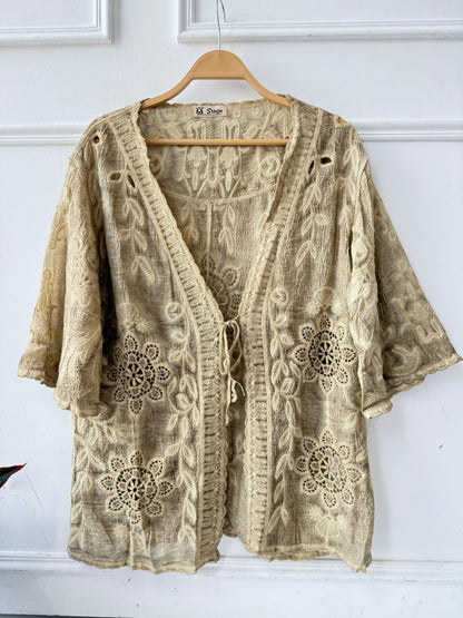 Elegant embroidered lace kimono by Amenaa featuring intricate lace details and a flowing, lightweight design.