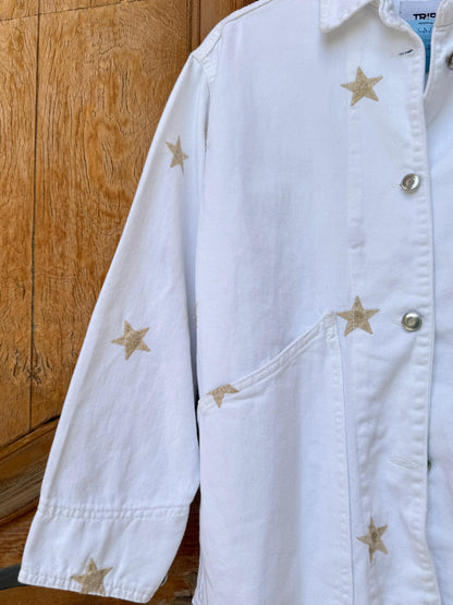Amenaa Star Gabardine Jacket displayed on a hanger, featuring a stylish dark gabardine fabric with star accents.