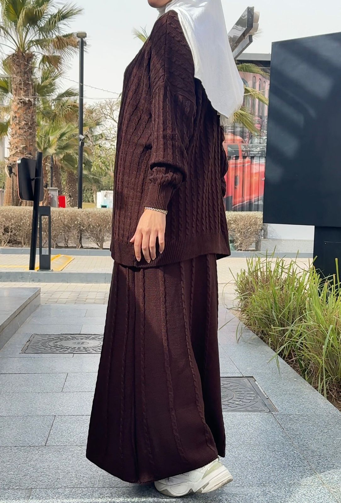 Amenaa knitted set featuring a cozy sweater and matching pants in soft fabric, perfect for casual wear.