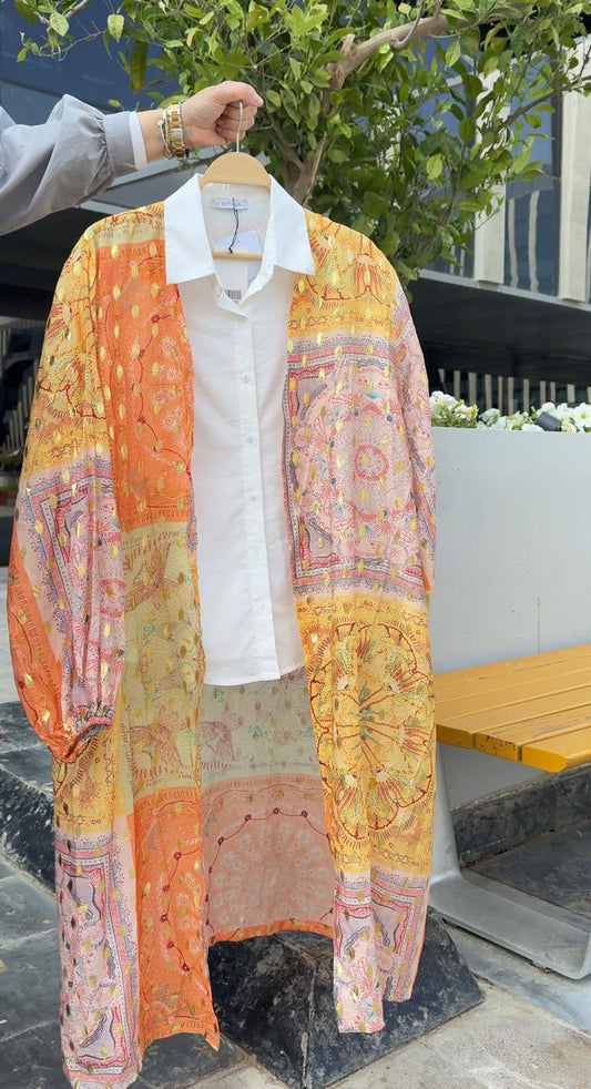 Printed Amenaa kimono with floral design, lightweight fabric, flowing fit, and intricate pattern visible in the image.