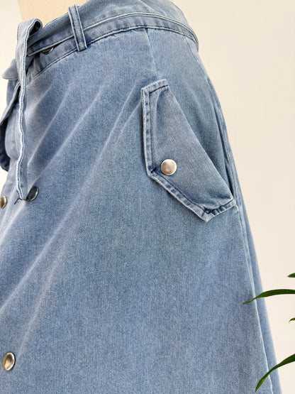 Amenaa button denim skirt with front buttons and classic blue denim fabric, styled for casual or trendy outfits.