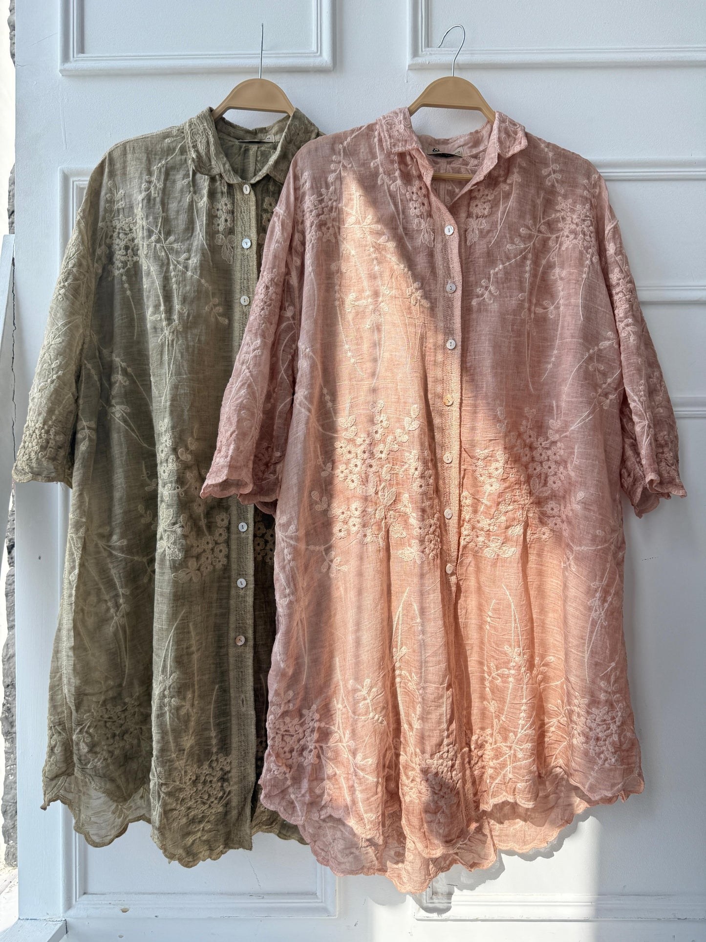 Embroidered Amenaa shirt in vibrant fabric with intricate embroidery, showcasing detailed craftsmanship and stylish design.