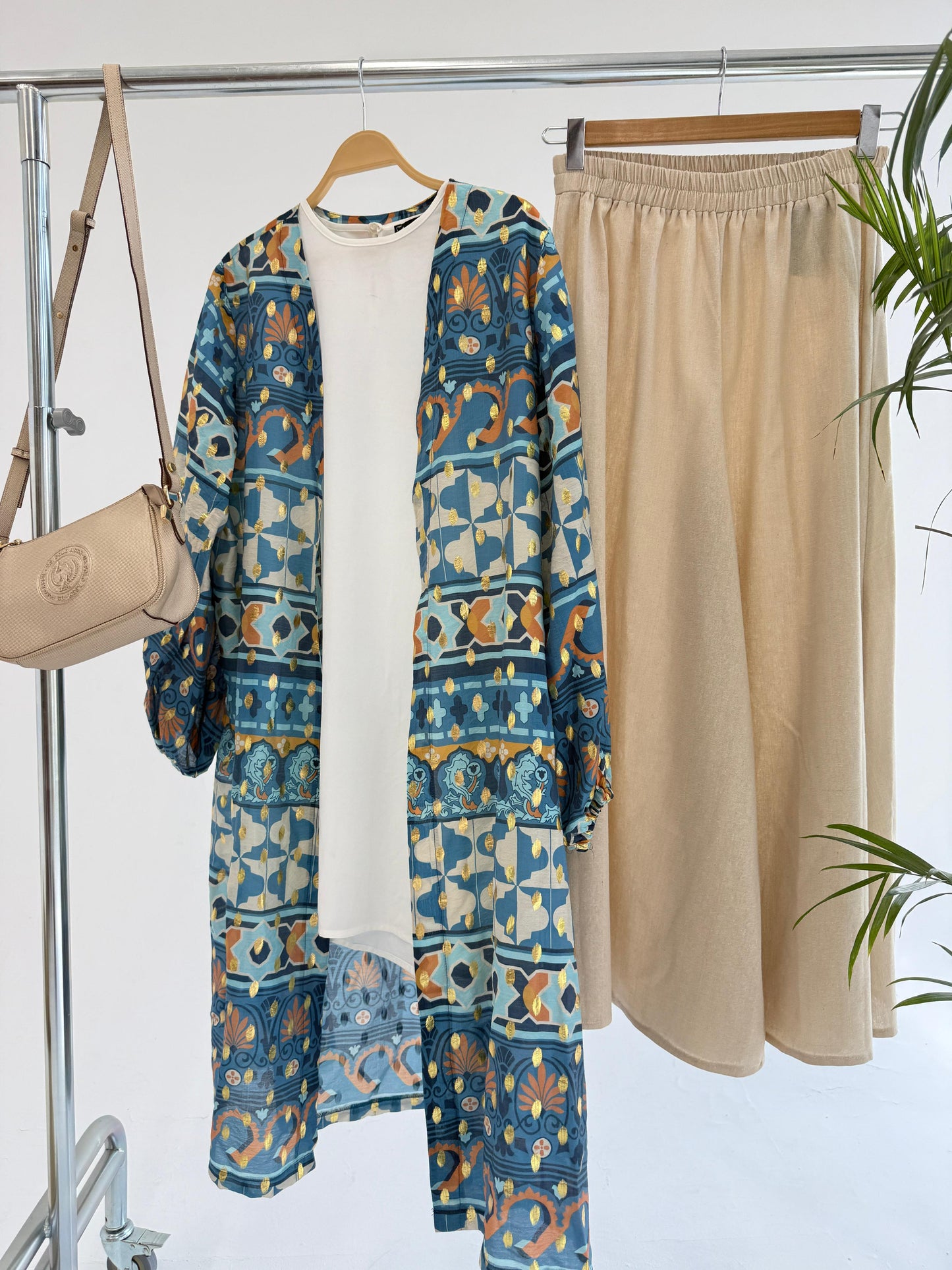 Amenaa mosaic pattern kimono with vibrant geometric design, flowing fabric, and traditional Japanese-inspired style.
