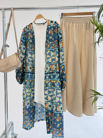 Amenaa mosaic pattern kimono with vibrant geometric design, flowing fabric, and traditional Japanese-inspired style.