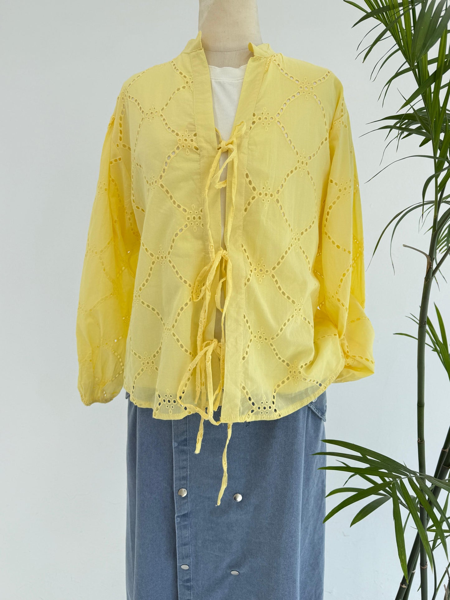 Amenaa Summer Rokama Tie Blouse in lightweight fabric, featuring a stylish tie detail and relaxed fit, perfect for warm weather.