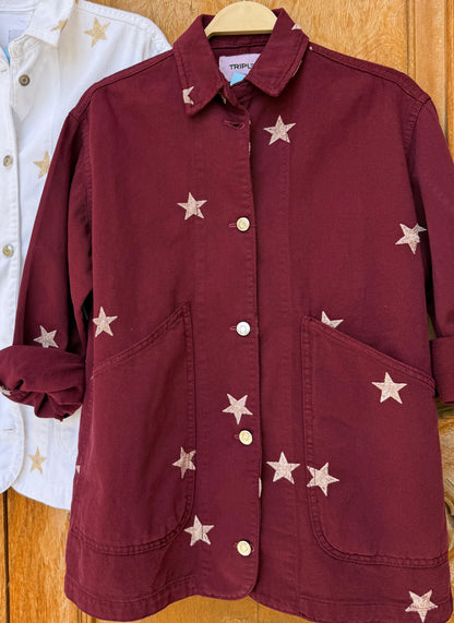 Amenaa Star Gabardine Jacket displayed on a hanger, featuring a stylish star pattern and classic gabardine fabric in neutral tones.