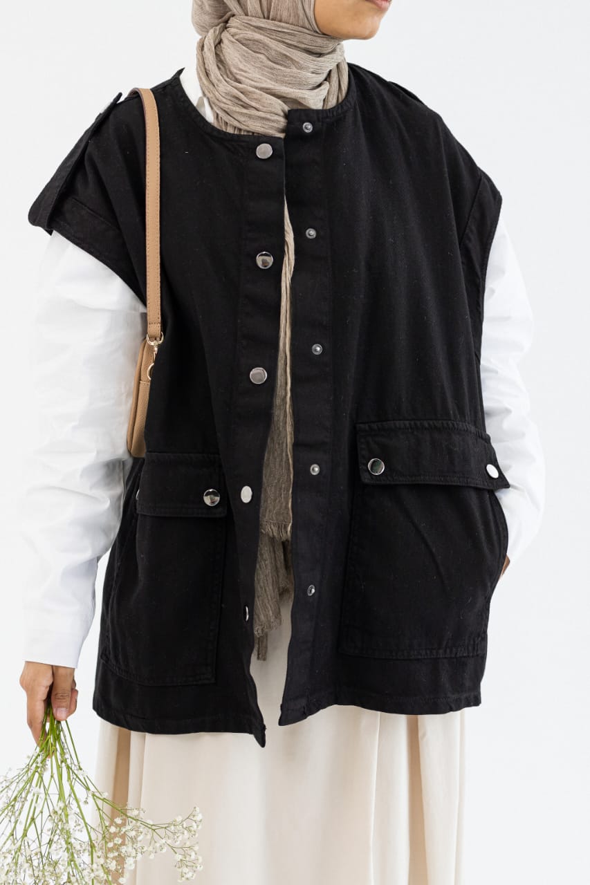 Amenaa gabardine vest in neutral fabric, front view showing tailored design and button details.